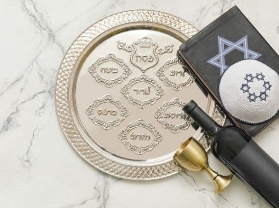 Silver Seder plate, haggadah, kiddush cup