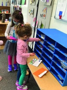 young children mailing letters