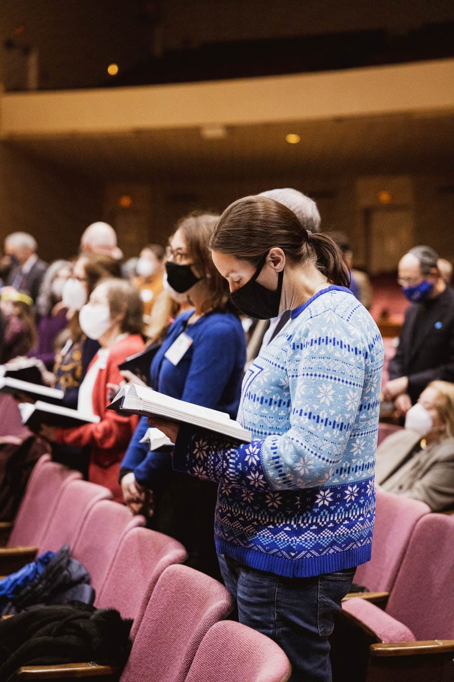 People standing in the Sanctuary during services