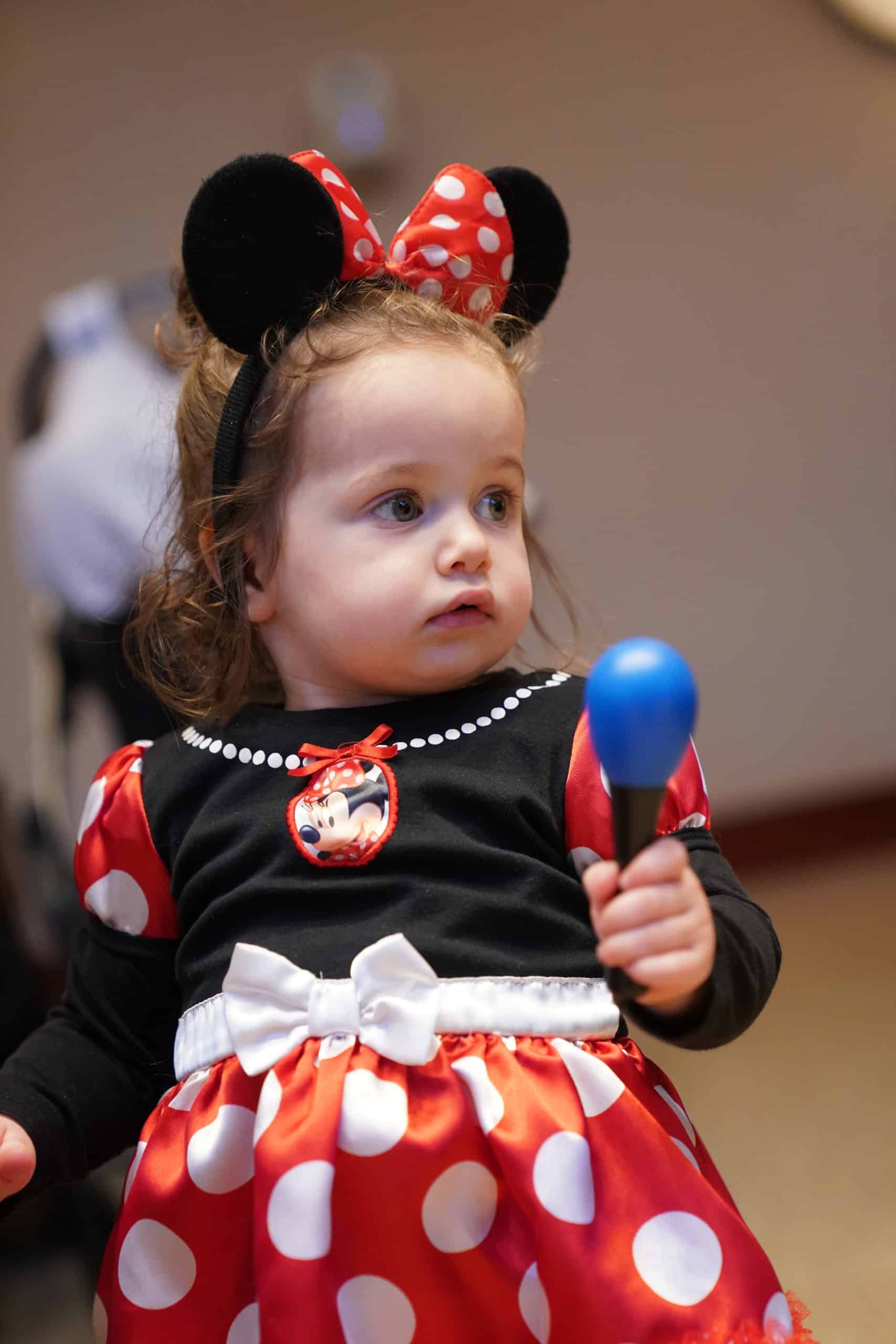 Toddler in Minnie Mouse costume