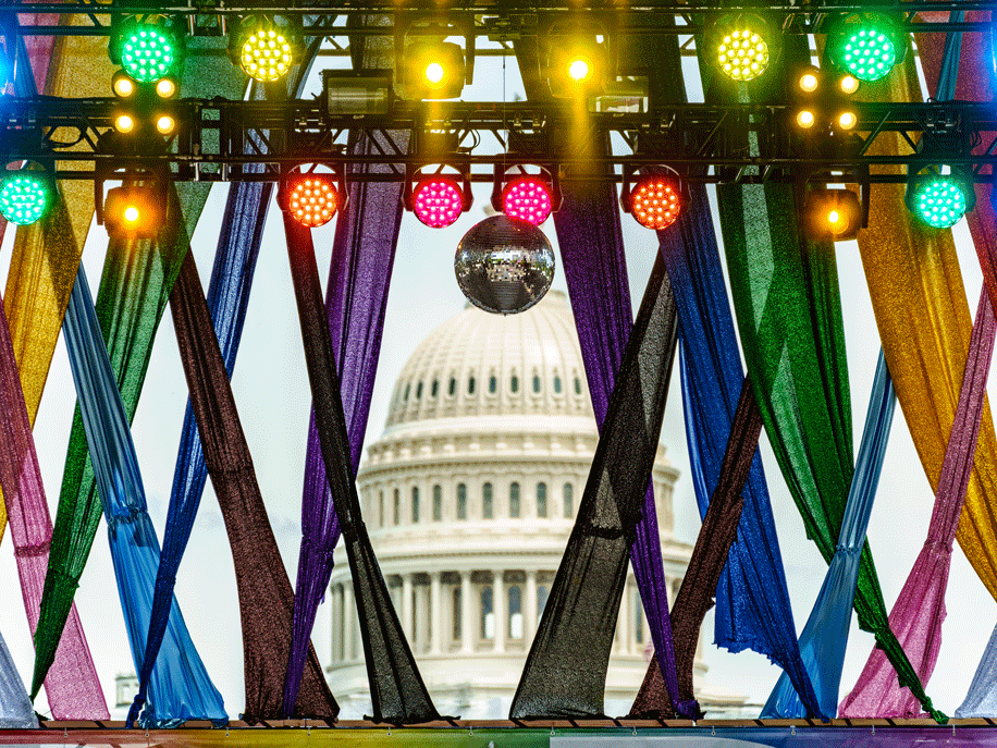 Capital dome in background with rainbow lights and curtains in front