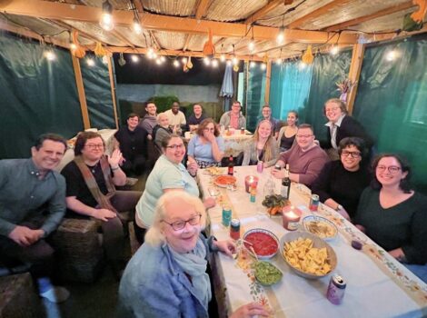 Group of people in a sukkah