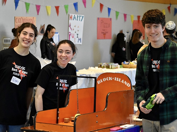 Teens helping out at Purim carnival