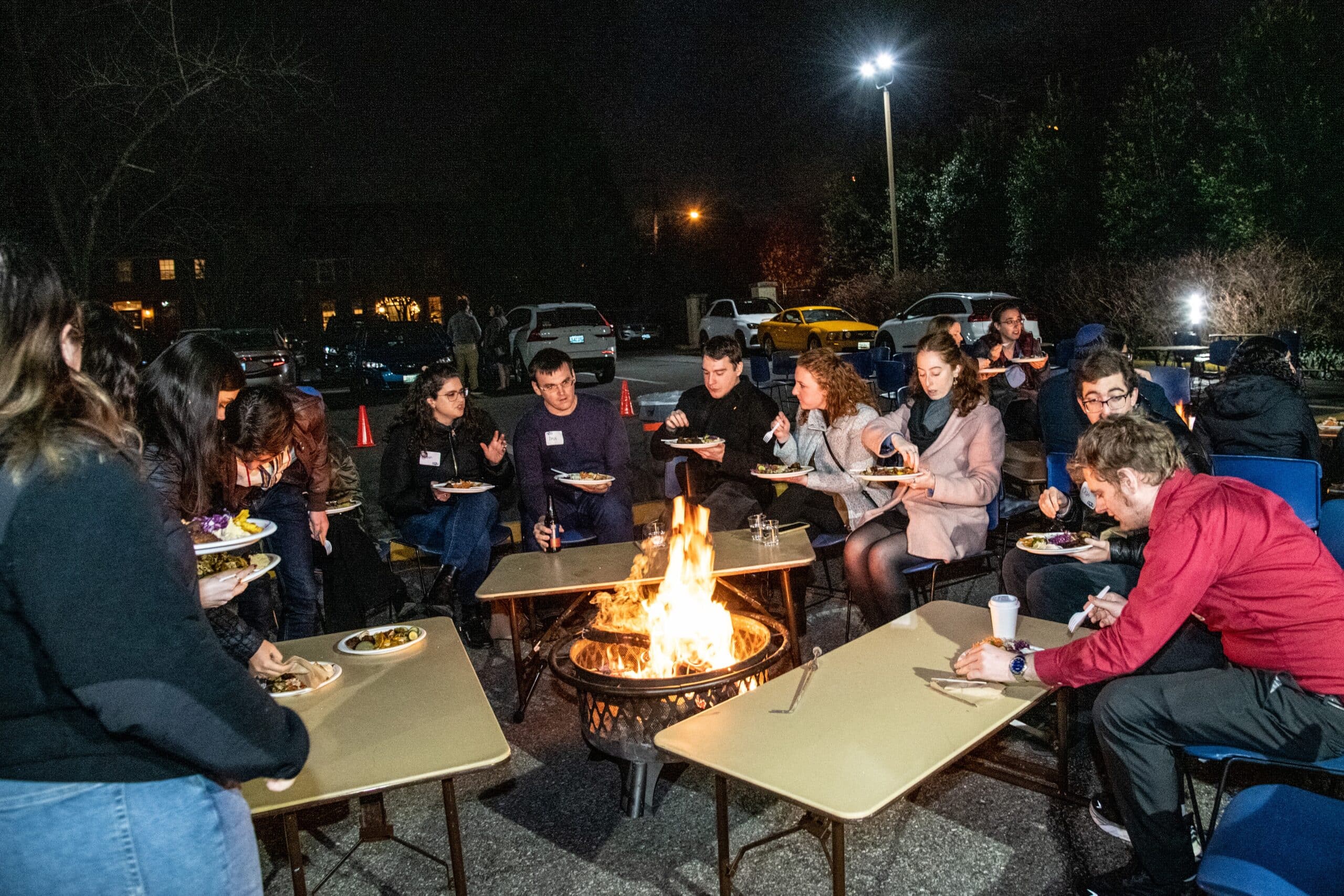 2239 members eating around a firepit